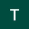 T.